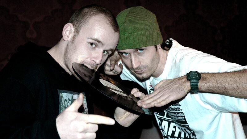 two men with vinyl record