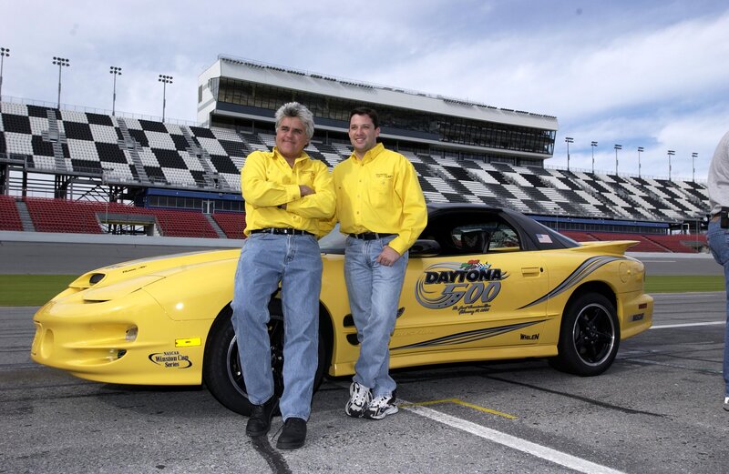 Two Men with Yellow Car