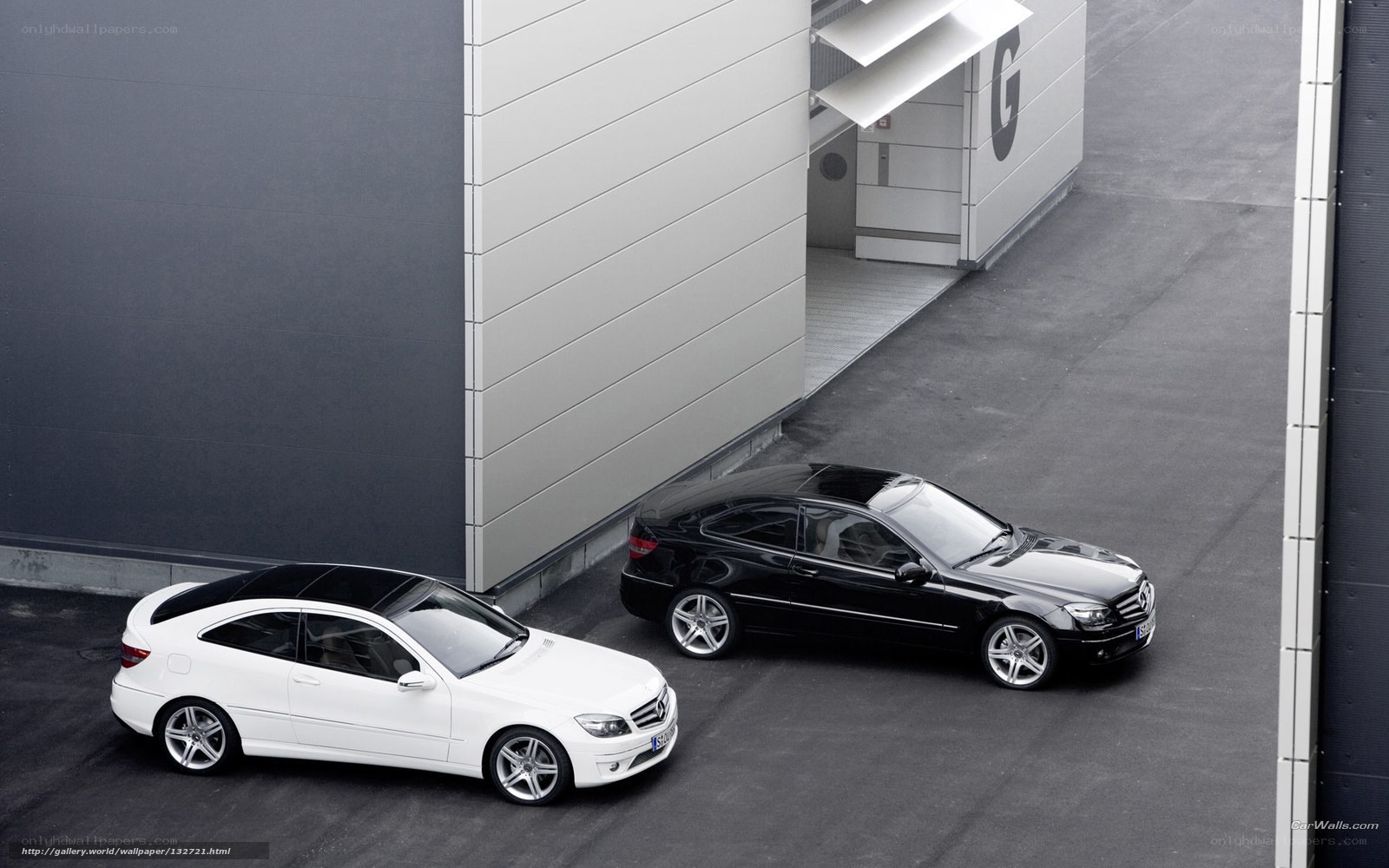 Two Mercedes-Benz C-Class coupes