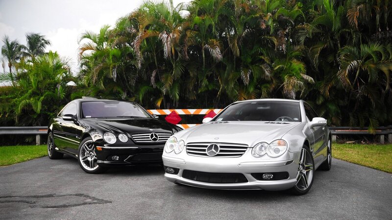 Two Mercedes-Benz cars parked