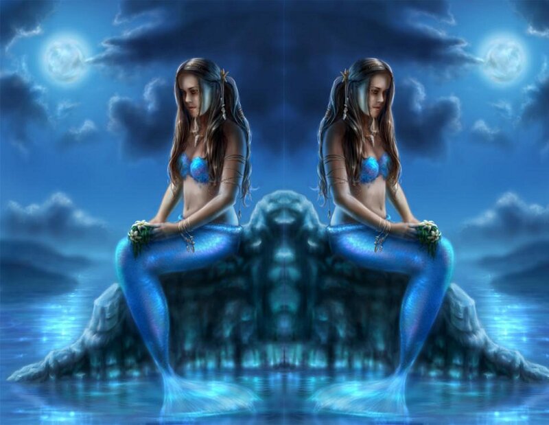 Two Mermaids on Rock