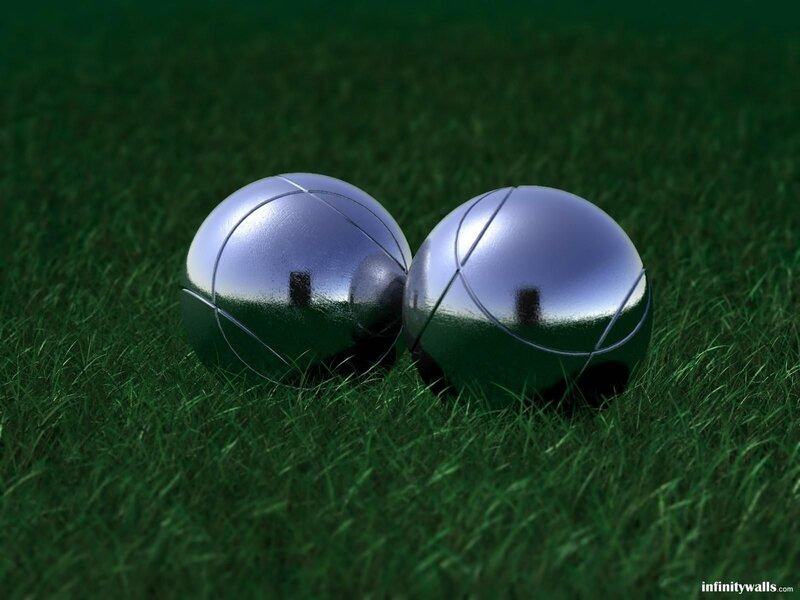 Two Metallic Balls on Grass