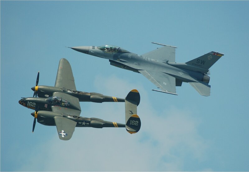 Two Military Aircraft — Blue, Clear, Afternoon