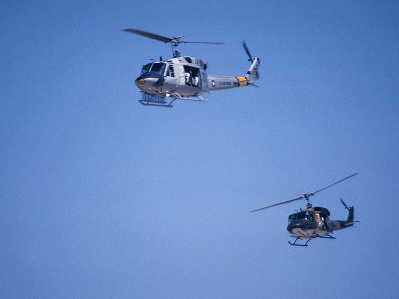 Two Military Helicopters — Blue, Calm, Afternoon