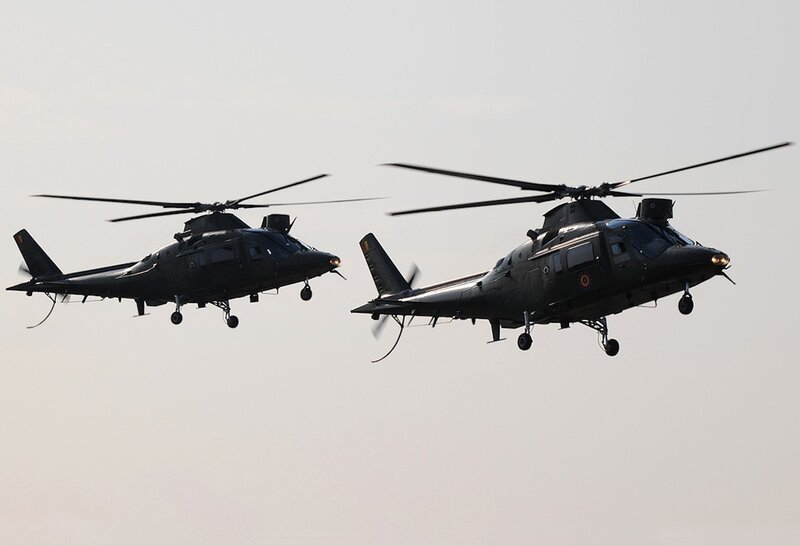 Two Military Helicopters — Gray, Dramatic, Photograph, Sky