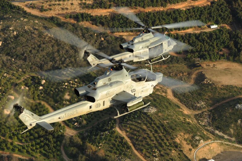 Two Military Helicopters — Green, Dramatic