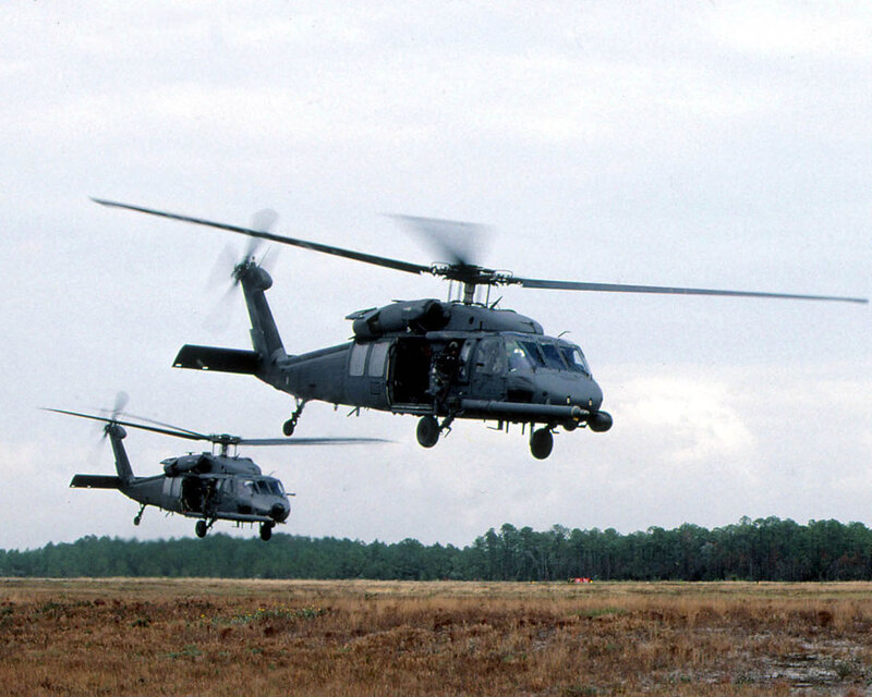 Two Military Helicopters