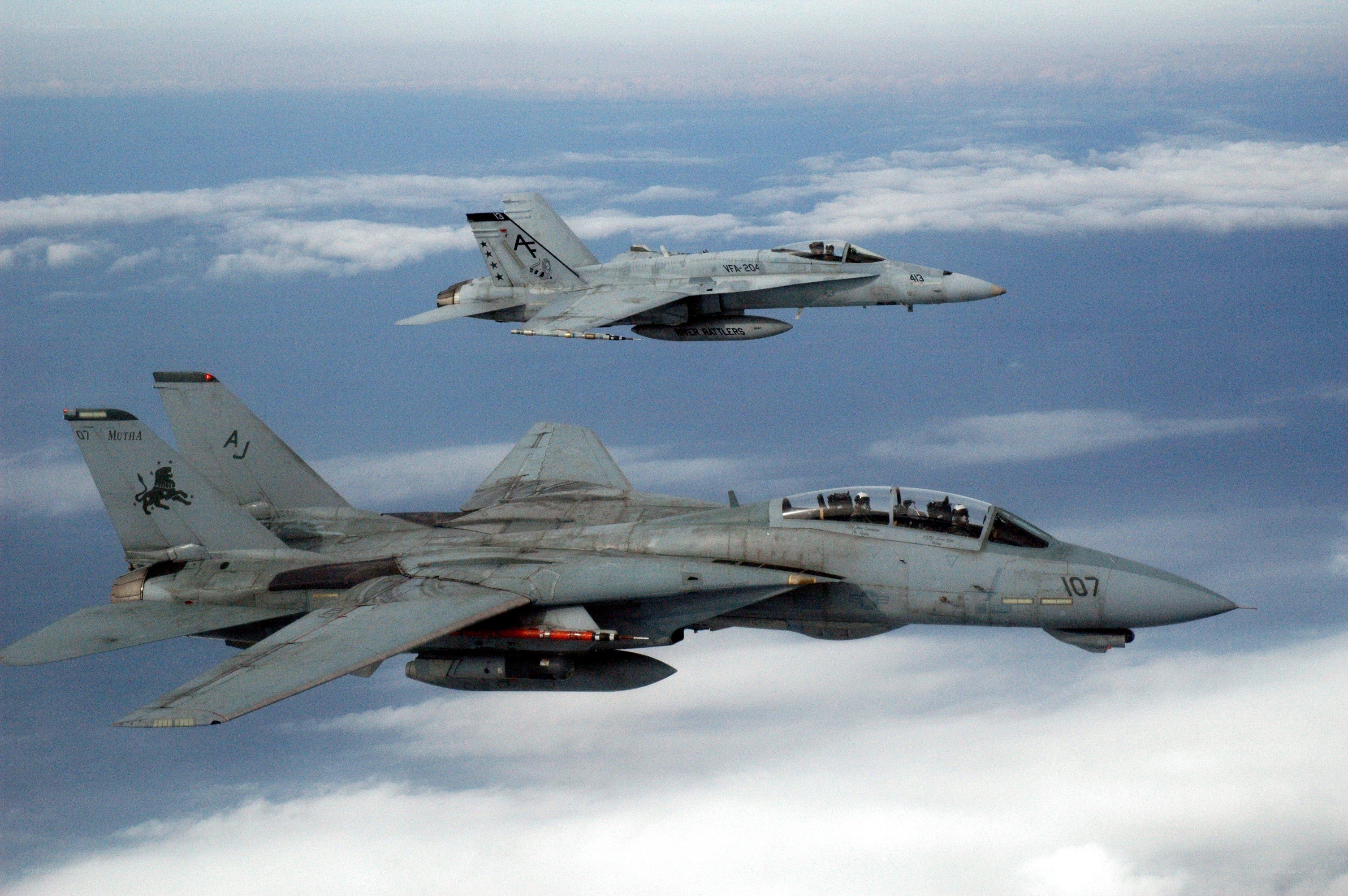 Two military jets in flight