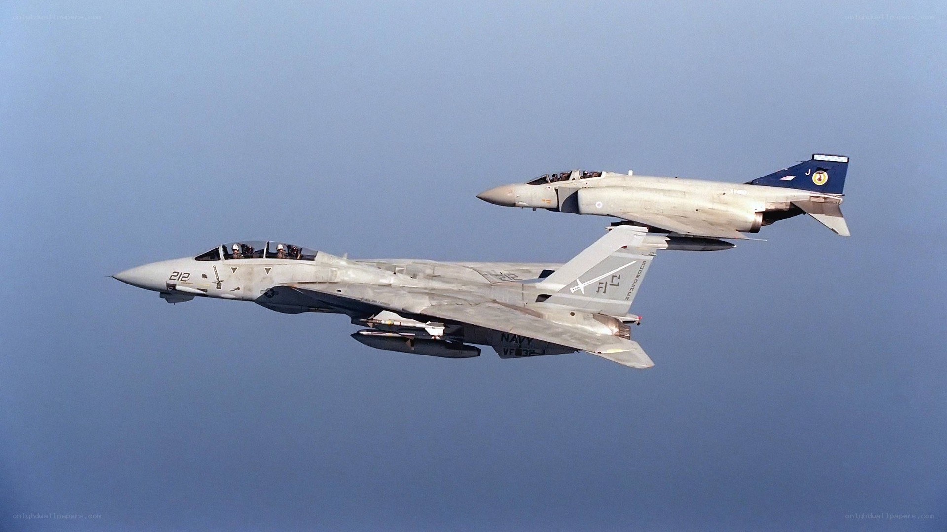 Two military jets in flight