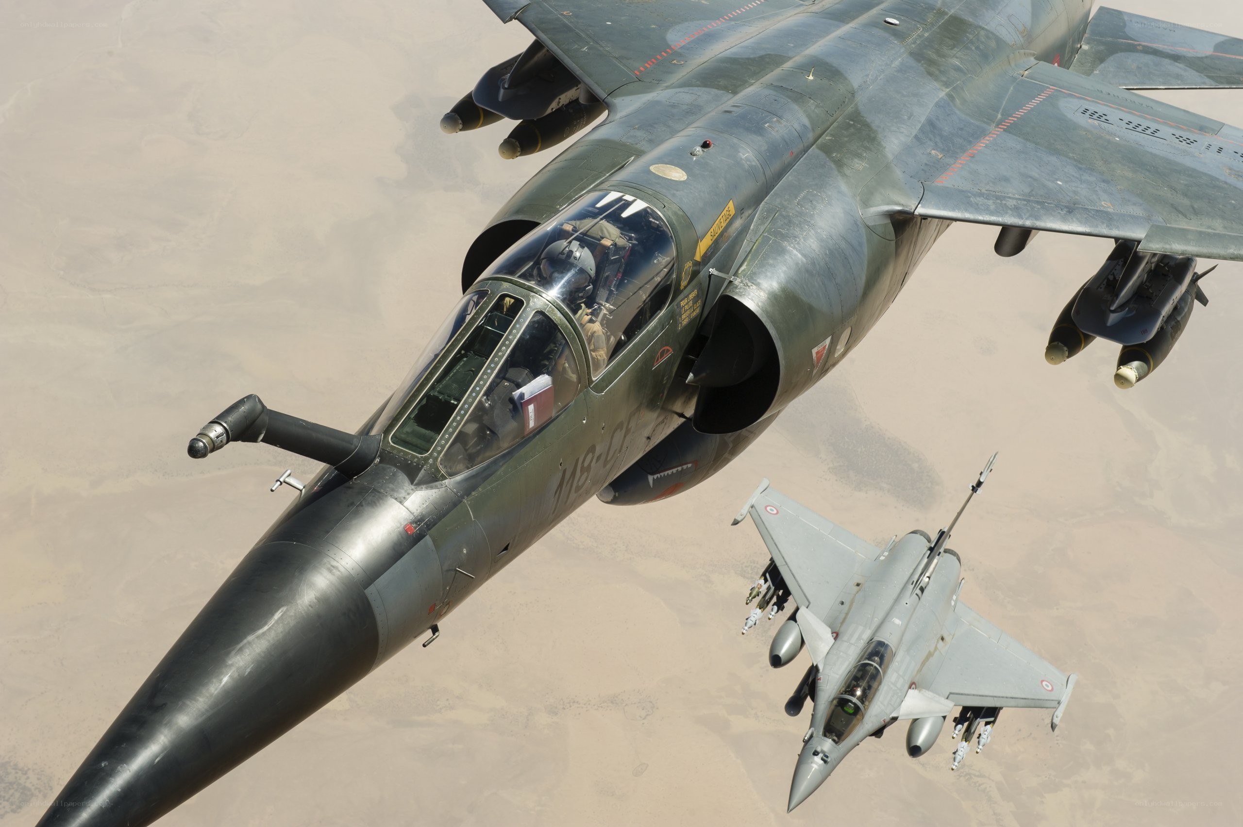 Two military jets in flight