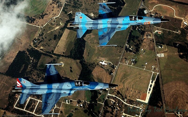 Two Military Jets in Flight — Blue