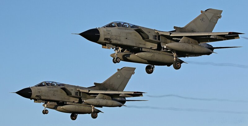 Two Military Jets in Flight — Gray