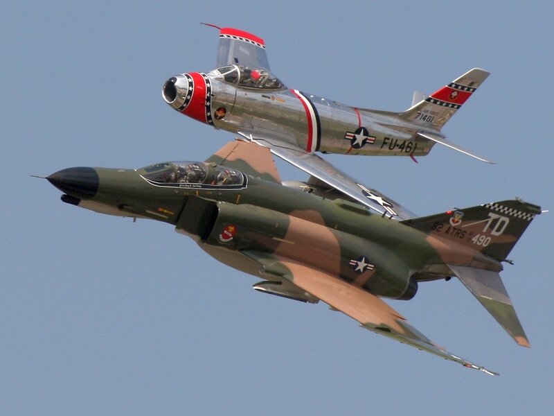 Two Military Jets in Flight — Green, Dynamic