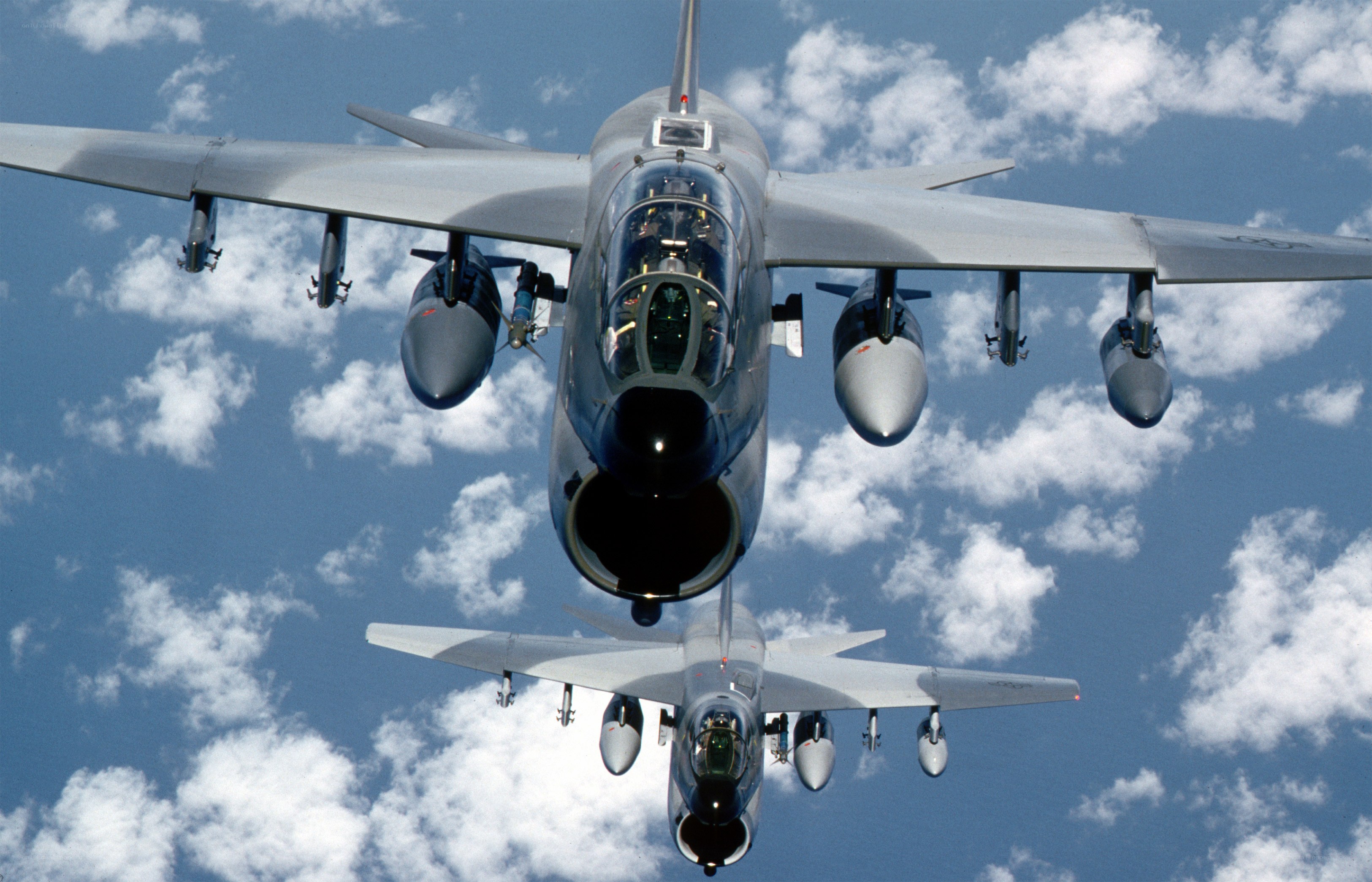 Two military jets in formation