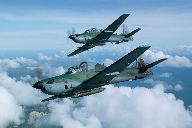 Two military trainer jets in flight