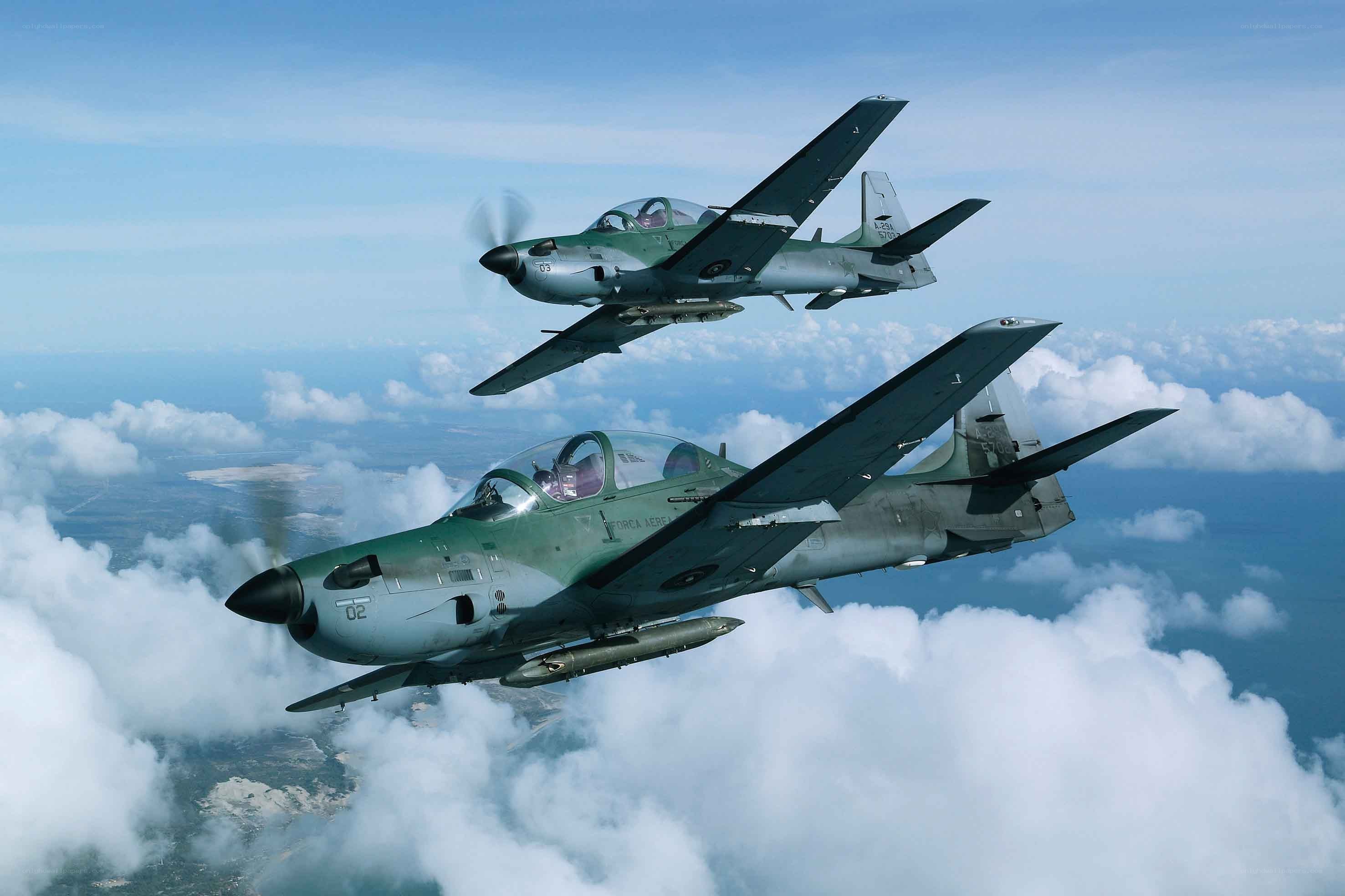 Two military trainer jets in flight
