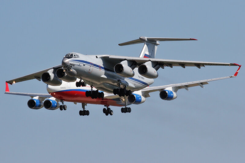 Two military transport planes in flight