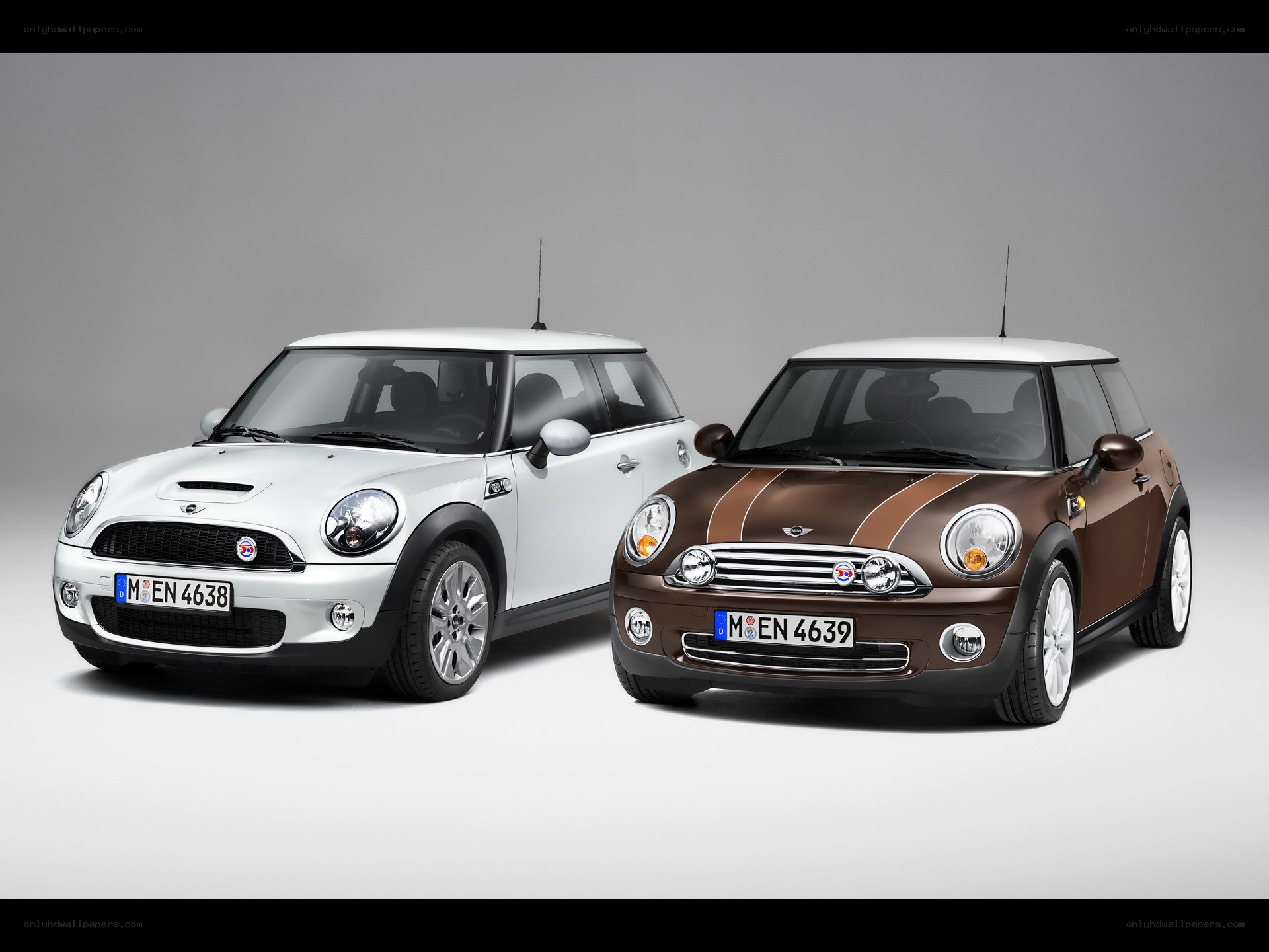 Two Mini Cooper cars side by side