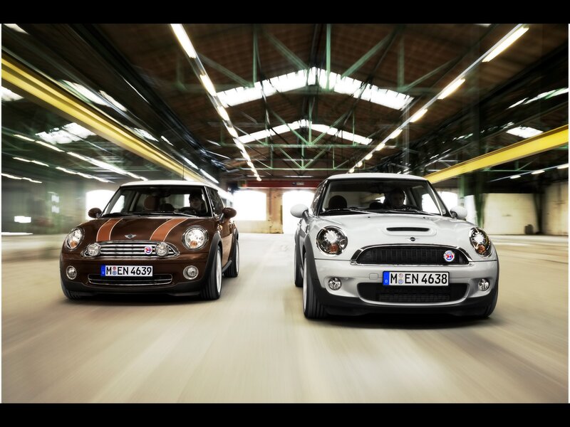 Two MINI Coopers in motion