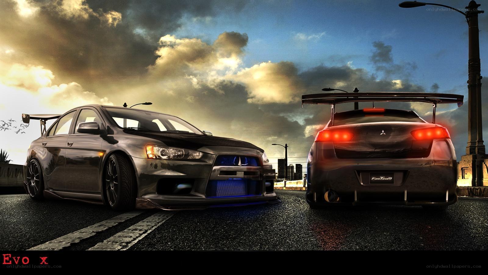 Two Mitsubishi Lancer Evos on road