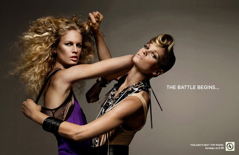 Two models in a battle pose
