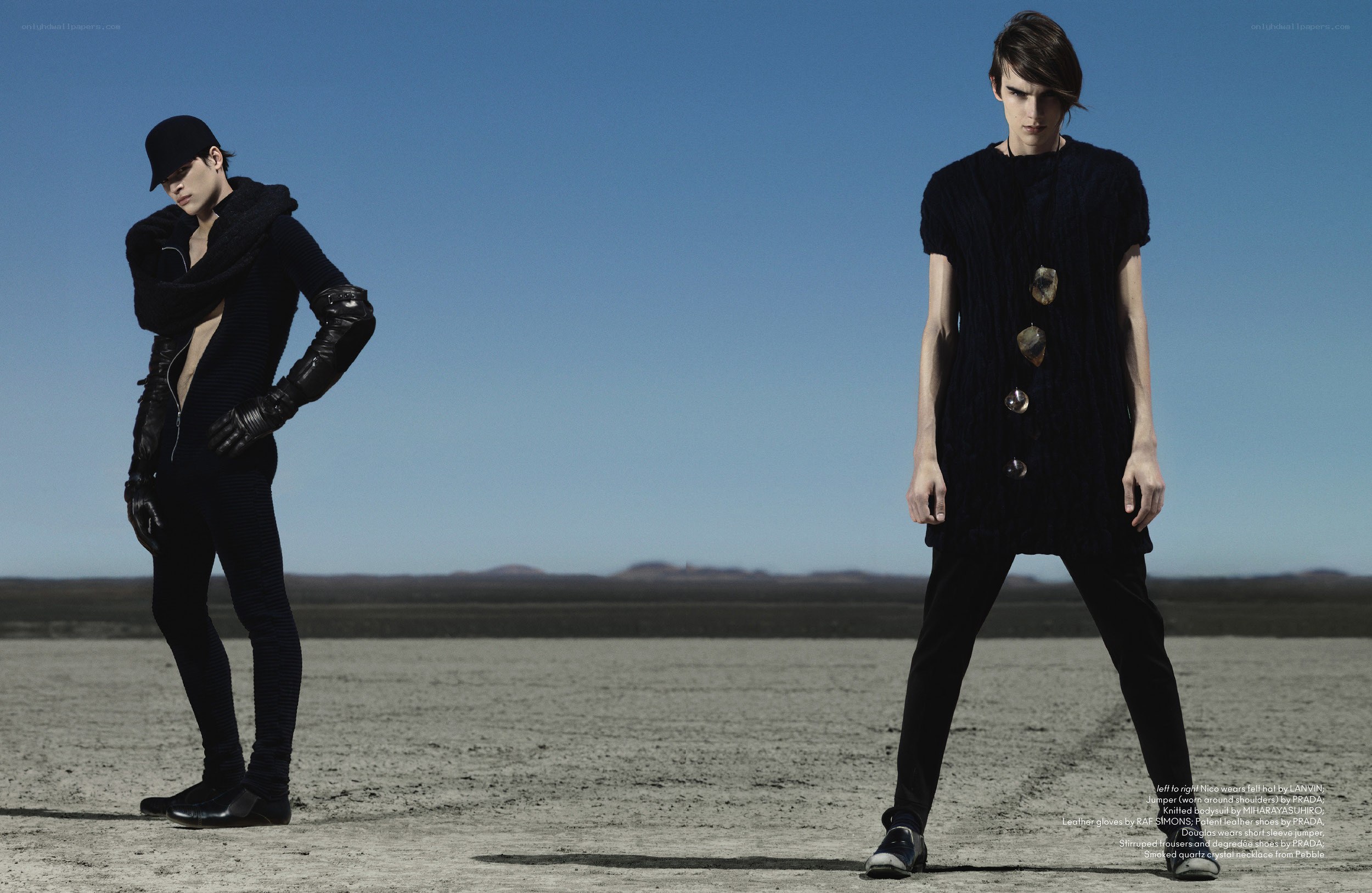 Two models in black outfits