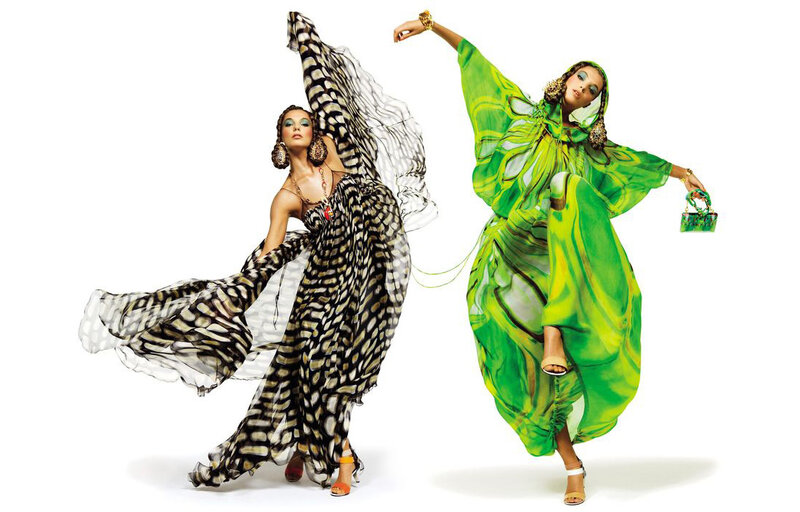Two models in flowing dresses