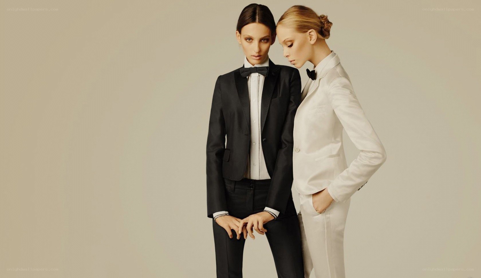 two models in tuxedos