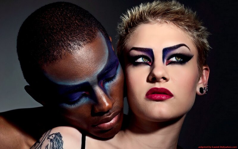 Two models with dramatic makeup