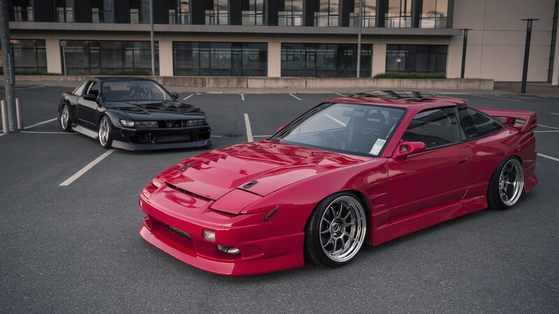 Two Modified Sports Cars — Red