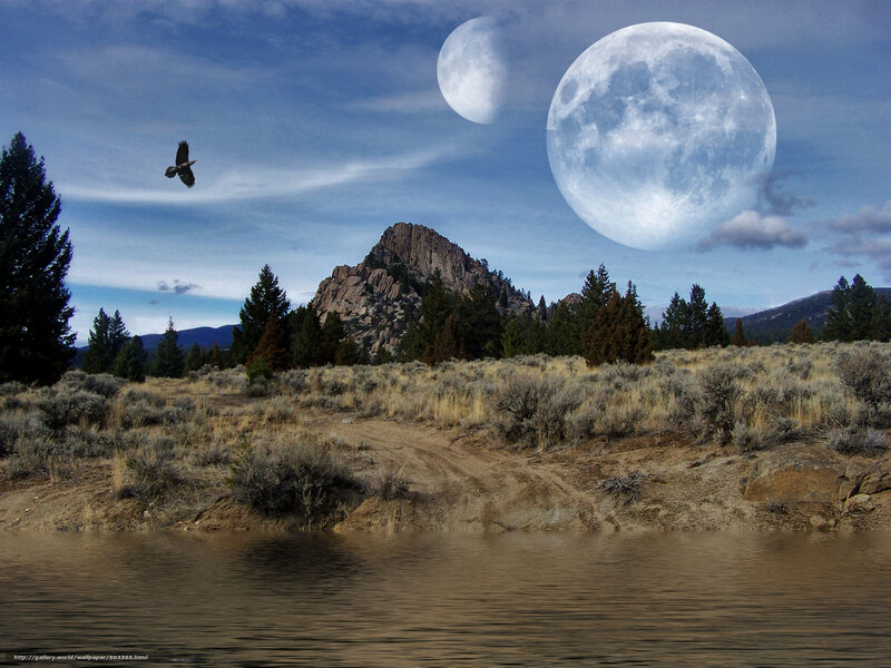 Two moons over a canyon
