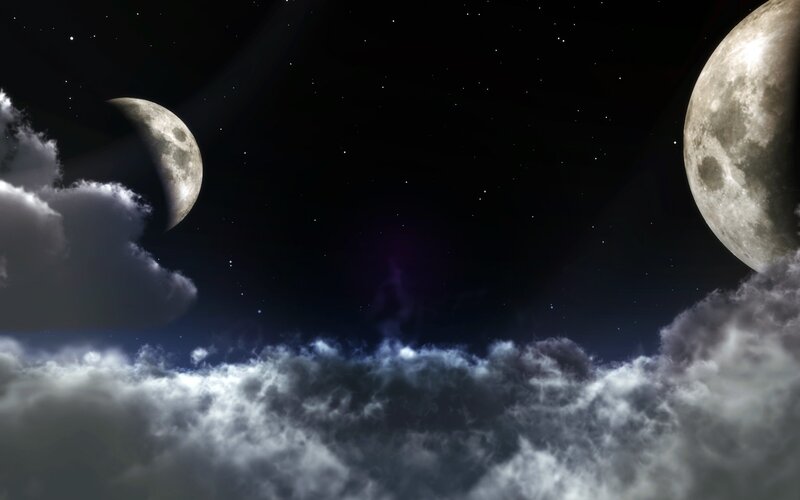 Two moons over clouds