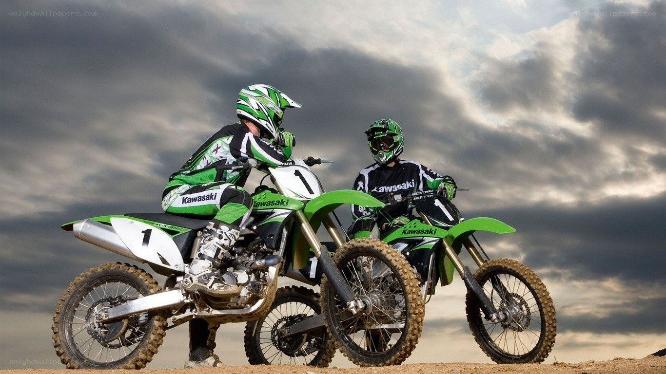 Two motocross riders on bikes