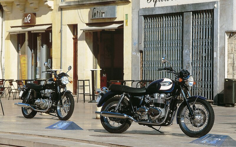 Two motorcycles on a city street