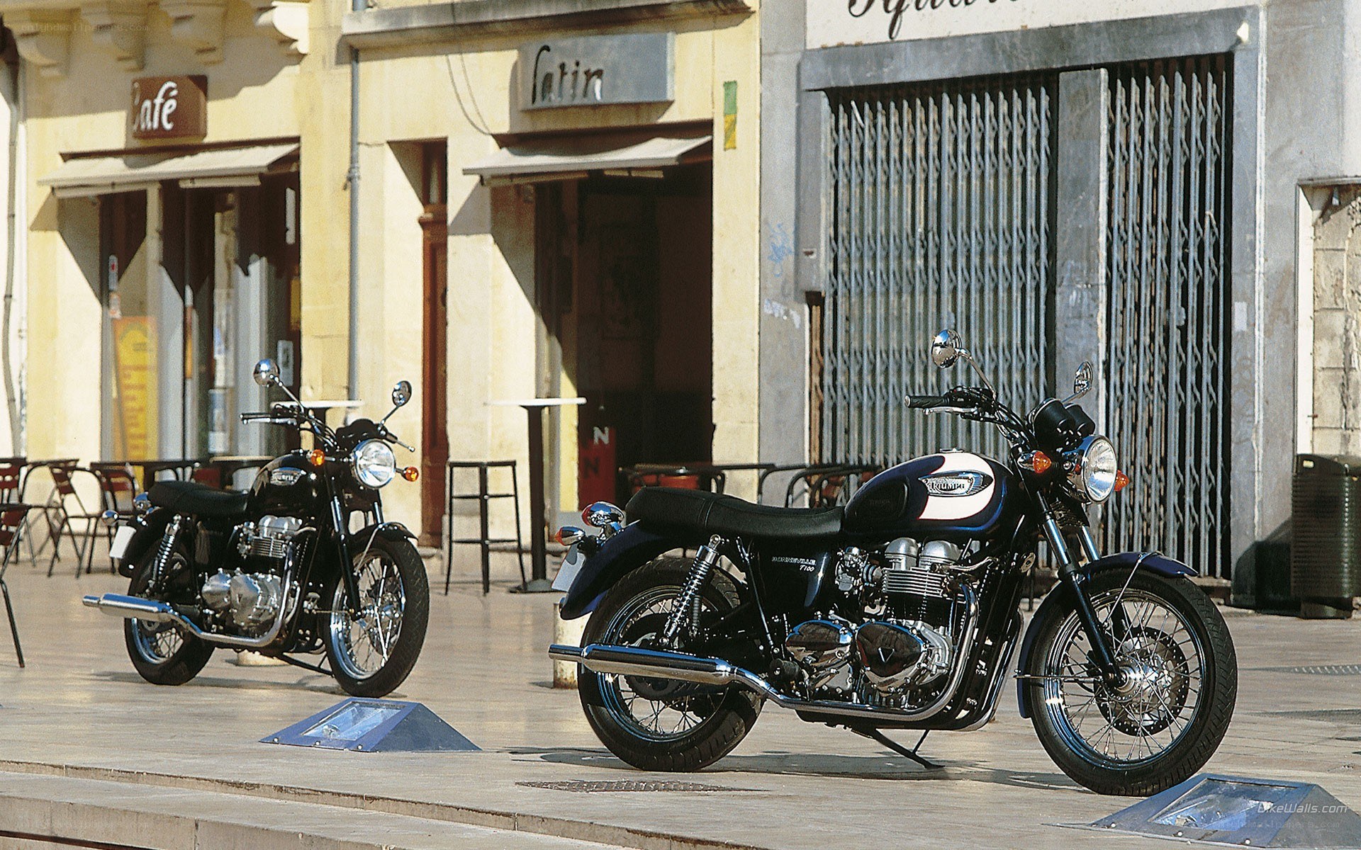 Two motorcycles on a city street