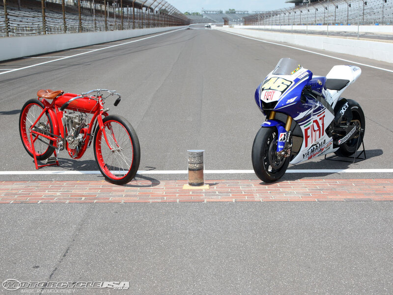 Two Motorcycles on a Racetrack