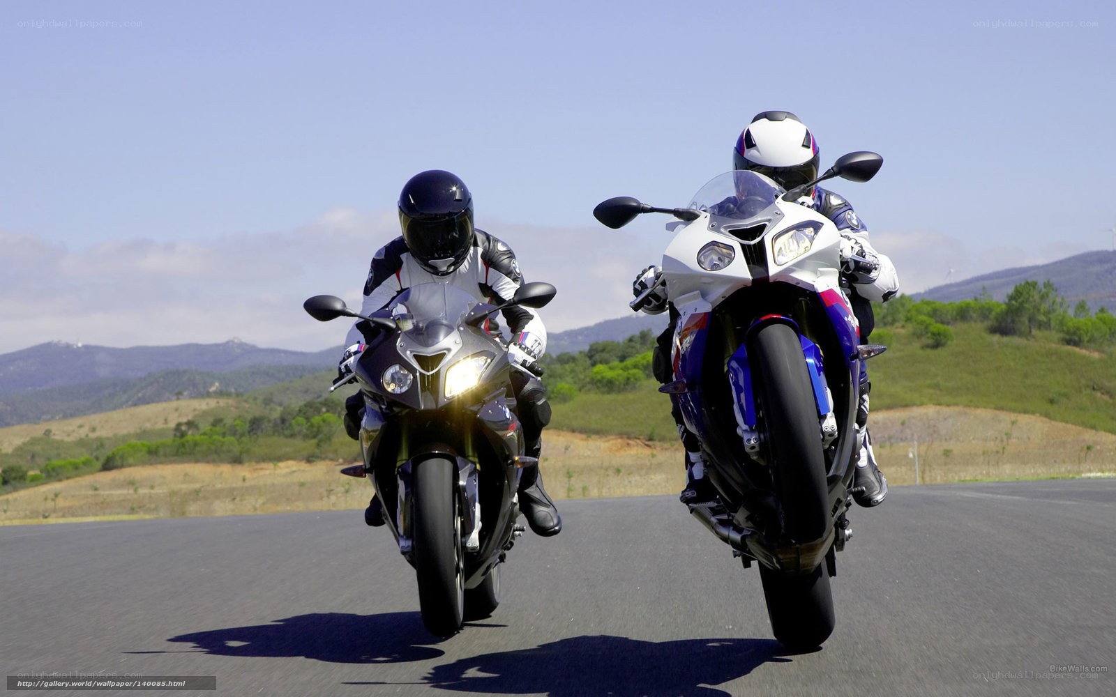 Two motorcyclists on a road