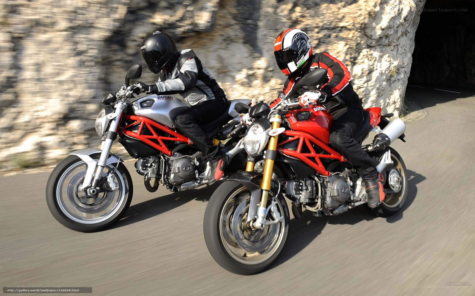 Two motorcyclists on Ducati bikes