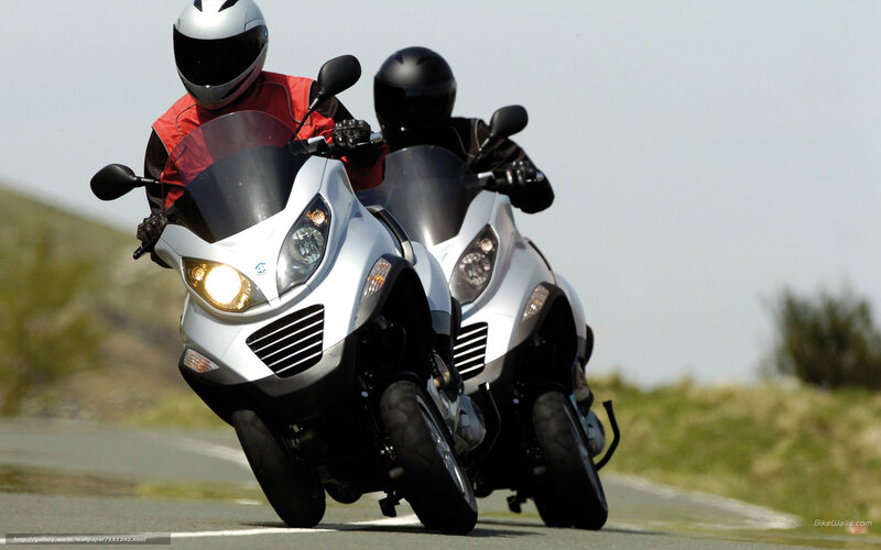 Two Motorcyclists on Road — White