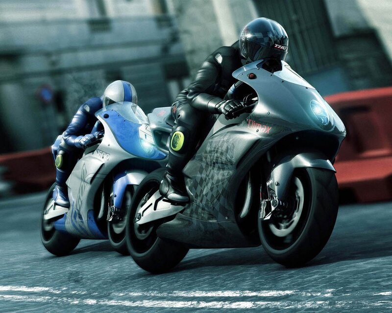 Two motorcyclists racing on a track