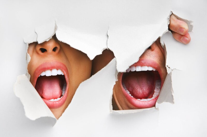 two mouths screaming through paper