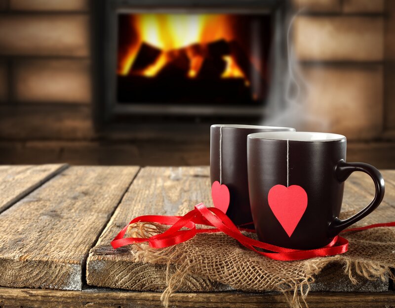 Two Mugs by Fireplace