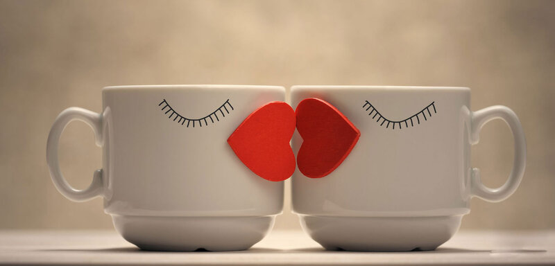 Two Mugs Kissing