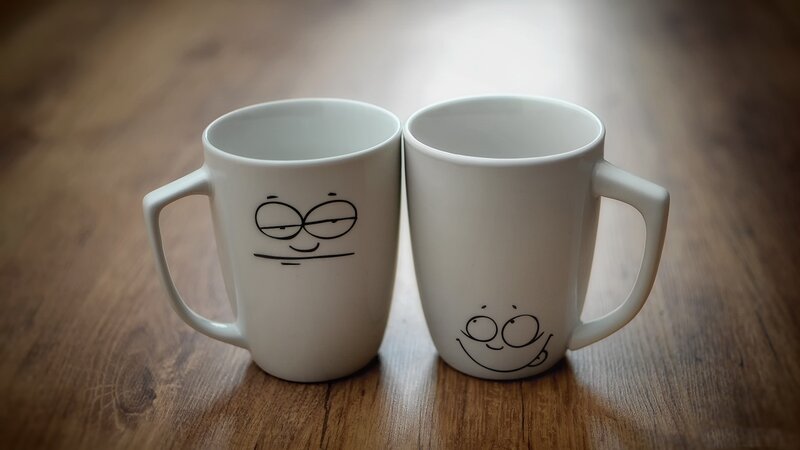 Two Mugs with Faces