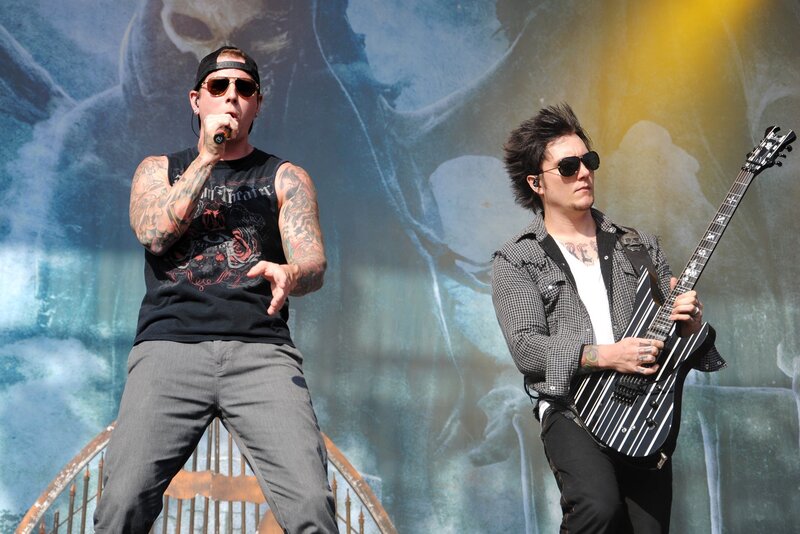 Two Musicians on Stage — Black, Energetic, Afternoon