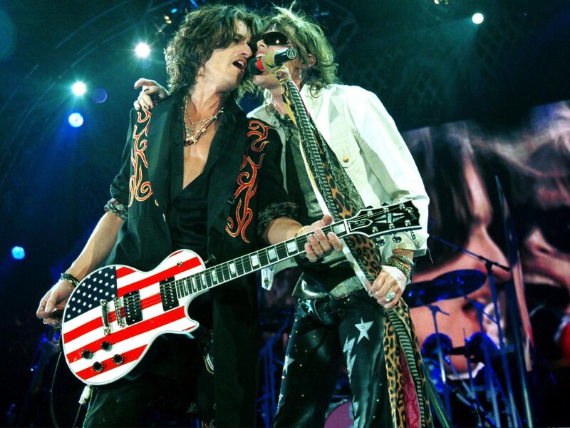 Two Musicians on Stage — Black, Energetic, Night, Photograph, Guitar