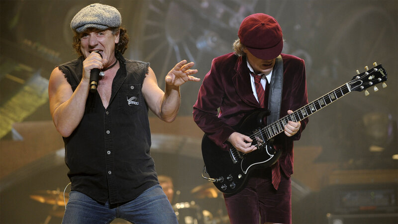 Two Musicians on Stage — Black, Energetic, Photograph, Guitar