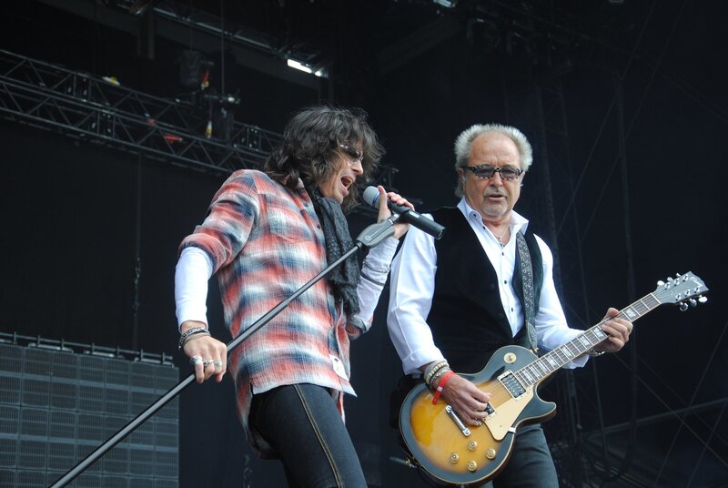 Two Musicians on Stage — Black, Energetic