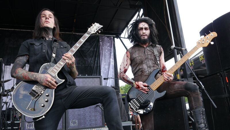Two Musicians on Stage — Black, Intense, Afternoon