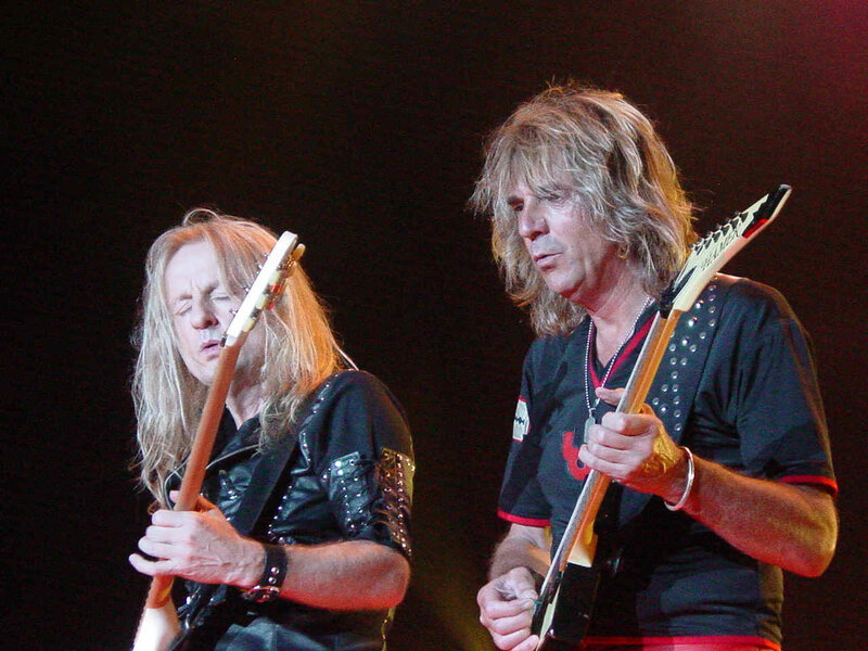 Two Musicians on Stage — Black, Intense